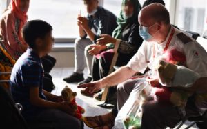 British Red Cross volunteers greeting Afghan refugees