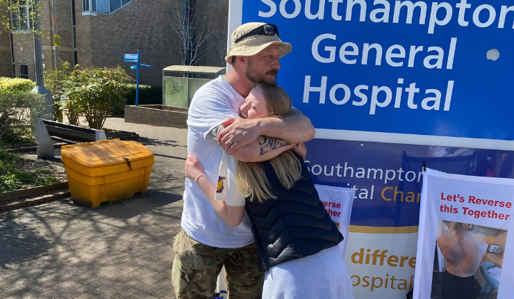 wayne and freya outside hospital after scoliosis treatment